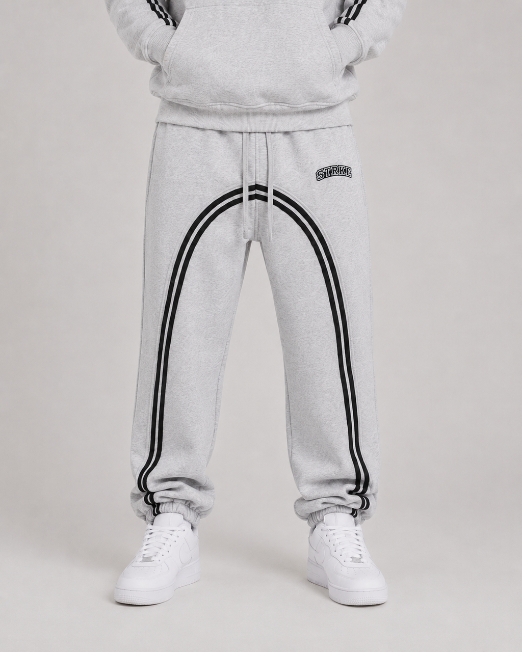 STRKE Striped Sweats