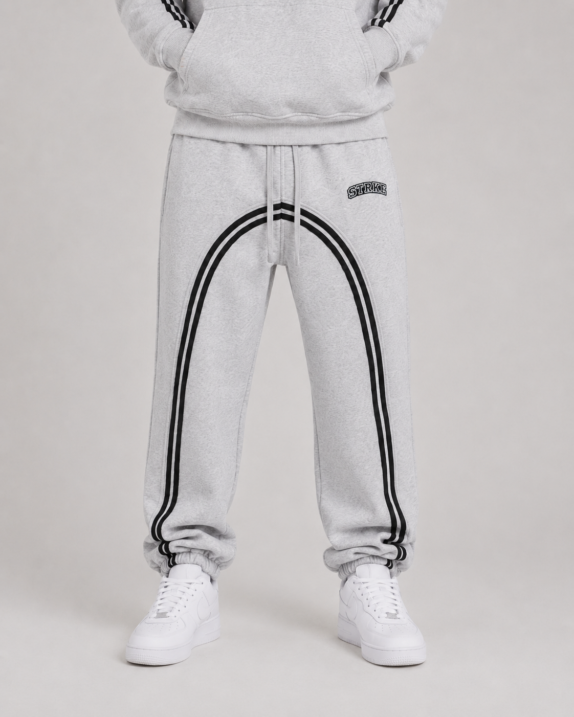 STRKE Striped Sweats
